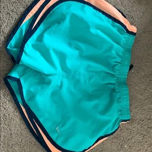 Women’s Nike blue and pink running shorts
